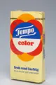 Tempo Color Packung aus den 1970ern mit buntem Blumendesign und der Aufschrift „frisch und farbig“.